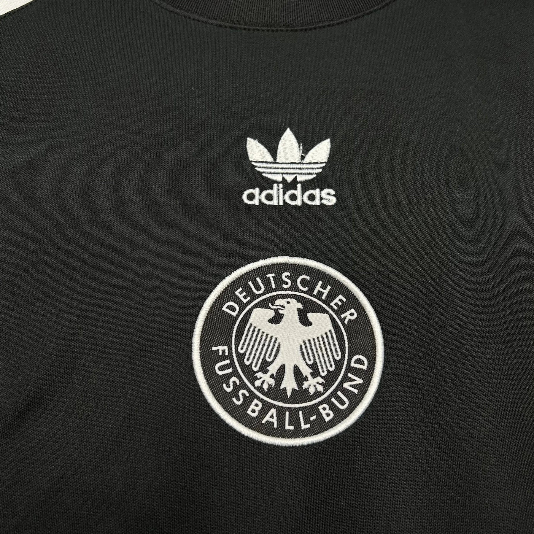 "Camisa Alemanha Pré-Jogo 24/25 - Torcedor Masculina Preta - Netmantos"