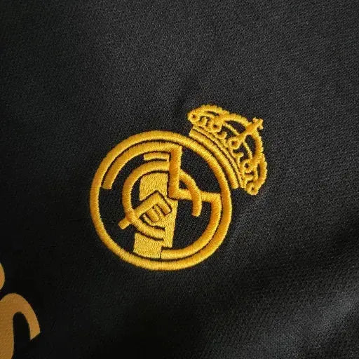 "Camisa Real Madrid Away II 23/24 - Torcedor Infantil Preta e Amarela - Netmantos"