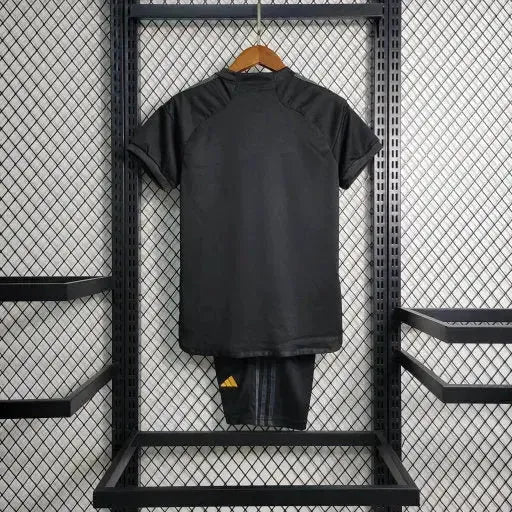 "Camisa Real Madrid Away II 23/24 - Torcedor Infantil Preta e Amarela - Netmantos"