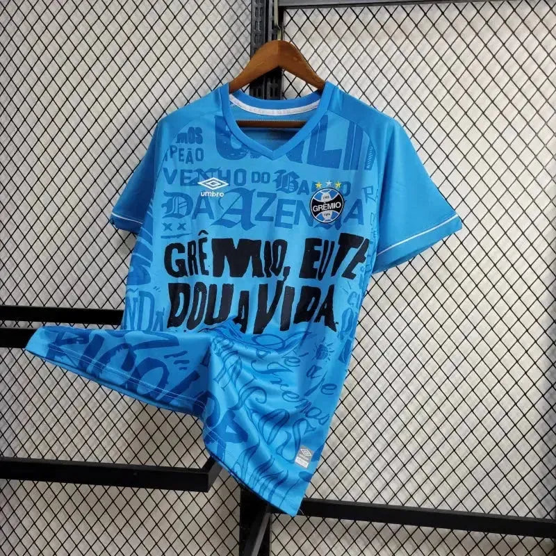 "Camisa Grêmio Treino 24/25 - Torcedor Masculina Azul - Grêmio, eu te dou a vida 1903 - Netmantos"
