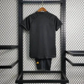 "Camisa Real Madrid Away II 23/24 - Torcedor Infantil Preta e Amarela - Netmantos"